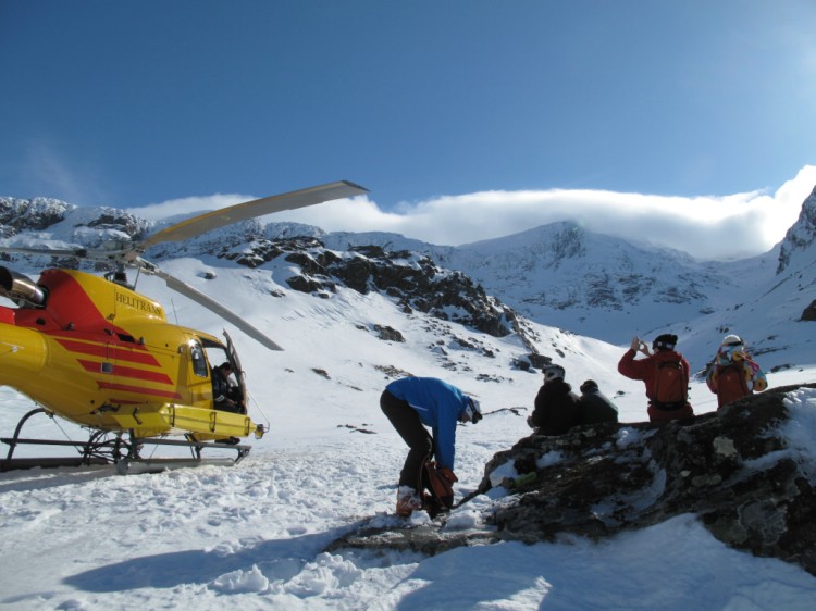 Enjoying the view and a picnic inbetween heli-runs, 2nd April 2010 Photo: Lisa Auer